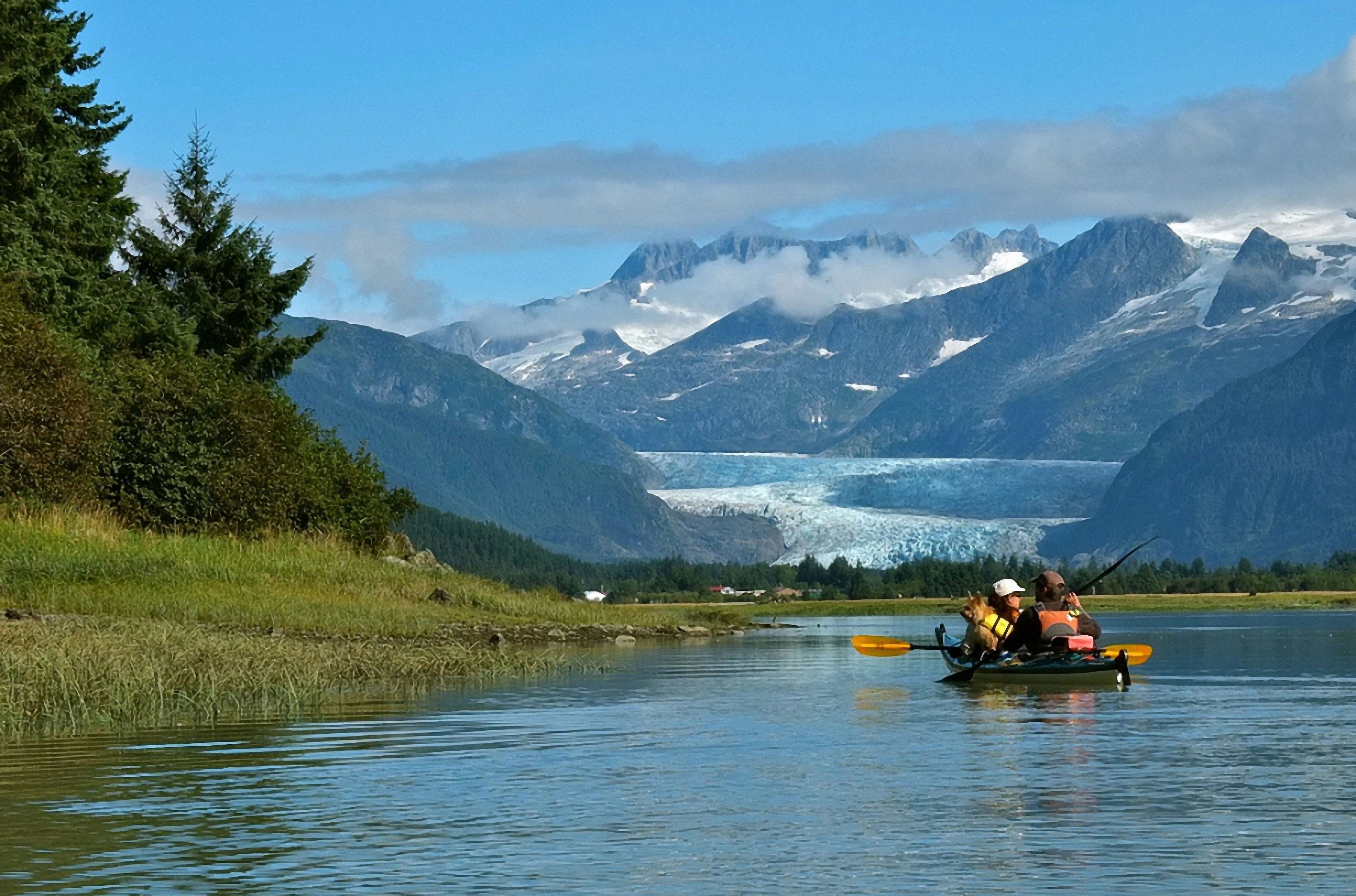 Hanging mountain glaciers visible from the rails, including Bartlett Glacier and Trail Glacier